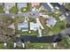 Overhead view showcasing the property's location within a waterfront canal community at 11820 Watts Ct, Tavares, FL 32778