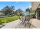 Backyard patio with canal view at 11820 Watts Ct, Tavares, FL 32778