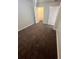 An empty bedroom with two doors and brown carpeting at 11943 Iselle Dr, Orlando, FL 32827