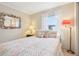 Comfortable bedroom with a cozy bed and soft lighting, creating a warm atmosphere at 1430 Mohawk Cir, Tavares, FL 32778