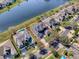 Aerial view showcasing a home near a tranquil lake, offering peaceful waterfront living at 16126 Bristol Lake Cir, Orlando, FL 32828