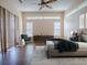 Spacious bedroom featuring a king-sized bed, dark wood floors, and modern design at 16126 Bristol Lake Cir, Orlando, FL 32828