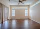 Bright bedroom with large windows and a ceiling fan at 16126 Bristol Lake Cir, Orlando, FL 32828