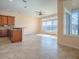 The living room features large windows offering scenic views and natural light at 16126 Bristol Lake Cir, Orlando, FL 32828