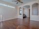 Living area with an elegant couch and an archway view into the next room at 16126 Bristol Lake Cir, Orlando, FL 32828