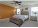 Bright primary bedroom with modern decor and abundant natural light at 2024 Hemingway Cir, Groveland, FL 34736