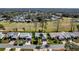 Aerial view of a lovely home in a golf community with mature trees and lush landscaping at 26148 Glen Eagle Dr, Leesburg, FL 34748