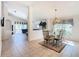 Dining area with tile flooring, decorative chandelier and clear view into the living room at 2917 White Cedar Cir, Kissimmee, FL 34741