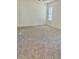 Large bedroom with neutral carpet, a ceiling fan, and a sunlit window at 32708 Westwood Loop, Leesburg, FL 34748