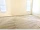 Spacious bedroom with carpet flooring and natural light at 32708 Westwood Loop, Leesburg, FL 34748
