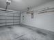 Garage with lots of open space to park two cars at 32708 Westwood Loop, Leesburg, FL 34748