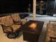 Outdoor seating and fire pit near the pool provide relaxing ambiance at 39136 Harbor Hills Blvd, Lady Lake, FL 32159