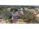 Aerial view of the home with a long driveway and mature trees surrounding the property at 489 Bohannon Blvd, Orlando, FL 32824