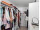 Organized walk-in closet with shelving and hanging racks offers plenty of storage space at 489 Bohannon Blvd, Orlando, FL 32824