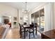 Bright breakfast nook features a sliding glass door to the patio, enhancing natural light at 5049 Harbour Dr # 1, Oxford, FL 34484