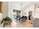 Dining room featuring a sliding glass door, tile floors, and natural light at 5049 Harbour Dr # 1, Oxford, FL 34484