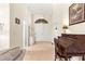 Front foyer featuring a unique double-door entry and tiled flooring at 5049 Harbour Dr # 1, Oxford, FL 34484