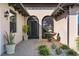 An elegant water feature and landscaped garden bed accent the front entrance at 5413 Sandy Hill Ln, Lady Lake, FL 32159