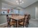 Dining area with seating for six opens to the kitchen for seamless entertaining at 610 Mallory Hill Dr, The Villages, FL 32162