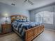 The spacious main bedroom offers great natural light and ample closet space at 610 Mallory Hill Dr, The Villages, FL 32162