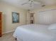 Spacious main bedroom with a ceiling fan and double closets at 610 Mallory Hill Dr, The Villages, FL 32162