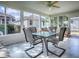 Bright sunroom with tile flooring and plenty of natural light at 610 Mallory Hill Dr, The Villages, FL 32162