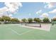 Community tennis courts offer a great space for active recreation, set in a well-maintained, picturesque environment at 6250 Sailboat Ave, Tavares, FL 32778