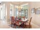 Dining room with abundant natural light and chandelier at 631 Old Mount Dora Rd, Eustis, FL 32726