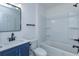 Bathroom featuring a tub and vanity with updated fixtures and bright lighting at 654 Nw 9Th Ave, Webster, FL 33597