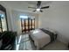 Bright bedroom with natural light features neutral decor, and a ceiling fan at 654 Nw 9Th Ave, Webster, FL 33597