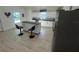 Bright kitchen features a central island with bar seating and sleek, modern appliances at 654 Nw 9Th Ave, Webster, FL 33597