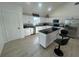 Spacious kitchen with modern island and stylish black hardware at 654 Nw 9Th Ave, Webster, FL 33597
