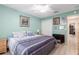 Bedroom with a queen bed, neutral walls, ceiling fan, and closet at 8373 Se 177Th Bartram Loop, The Villages, FL 32162