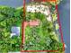 Aerial view of property highlighting its extensive acreage, waterfront location, and well-maintained landscaping at 840 2Nd St, Clermont, FL 34711