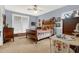 Bedroom with blue walls and an eclectic mix of furniture at 840 2Nd St, Clermont, FL 34711