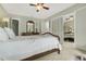 Spacious bedroom featuring carpet and a large mirror closet at 840 2Nd St, Clermont, FL 34711