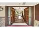 Inviting foyer featuring carved double doors that open into the home at 840 2Nd St, Clermont, FL 34711