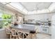 Bright kitchen with white cabinets, bar seating, and natural light at 840 2Nd St, Clermont, FL 34711