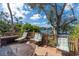 Relaxing outdoor deck area with comfortable seating and picturesque views of the lake at 840 2Nd St, Clermont, FL 34711