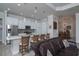 Kitchen with an island and stainless steel appliances, creating a modern and functional cooking space at 8682 Bridgeport Bay Cir, Mount Dora, FL 32757