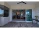 Inviting patio featuring a sliding glass door with a peek of the interior at 8682 Bridgeport Bay Cir, Mount Dora, FL 32757