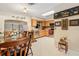 Kitchen featuring wood cabinets, tile backsplash, and stainless steel appliances at 1119 Cr 457, Lake Panasoffkee, FL 33538