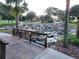 Picturesque water feature with rock formations and lush landscaping creates a serene environment at 1263 Legendary Blvd, Clermont, FL 34711