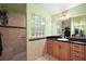 Spacious bathroom featuring a separate shower and modern vanity at 1339 Florence Path, The Villages, FL 32162