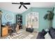 Bedroom with vaulted ceiling, ceiling fan, seaside decorations, and bright window at 1339 Florence Path, The Villages, FL 32162