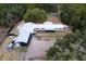 Aerial view of the home, property and horse facilities at 14100 Ne 46Th St, Silver Springs, FL 34488