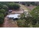 Aerial view of horse property with home, paddocks and outbuildings at 14100 Ne 46Th St, Silver Springs, FL 34488