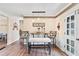 Charming dining area with pendant lighting, bench seating and wainscoting at 14100 Ne 46Th St, Silver Springs, FL 34488