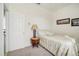 Bedroom with a woven table and single bed at 14842 Cedar Branch Way, Orlando, FL 32824