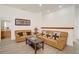 Inviting living room with cozy sofas, a coffee table, and a decorative aesthetic at 14842 Cedar Branch Way, Orlando, FL 32824